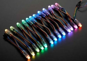 50 LED’s Pack 12mm Neo Pixels Addressable LED Diffused Digital RGB Pixel LED Light - a string of multi-coloured glowing LED bulbs with wire leads.