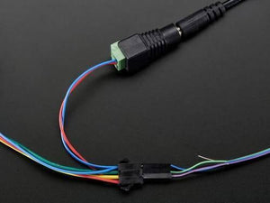 50 LED’s Pack 12mm Neo Pixels Addressable LED Diffused Digital RGB Pixel LED Light - shown with a black DC power jack connector and a black wire harness.