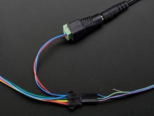 50 LED’s Pack 12mm Neo Pixels Addressable LED Diffused Digital RGB Pixel LED Light - shown with a black DC power jack connector and a black wire harness.