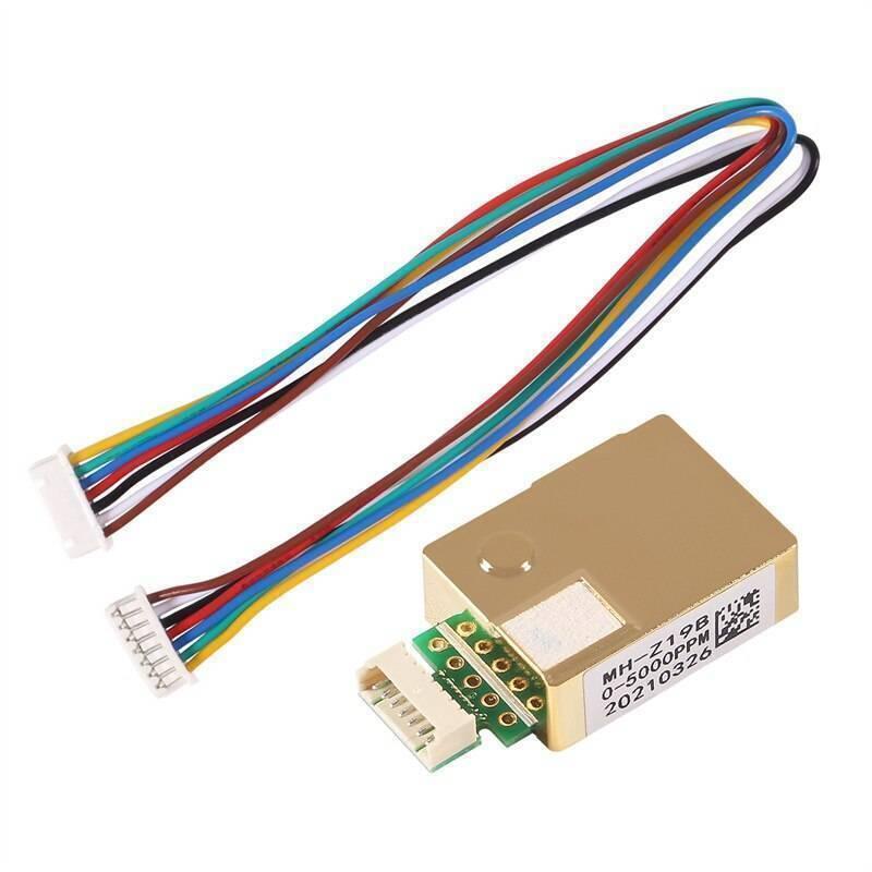 5000PPM MH-Z19B CO2 Sensor Module - shown with its gold-coloured metal housing, green circuit board, white connector port, and a multi-coloured wire harness.