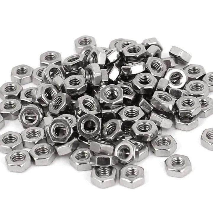 500pcs Metric M3 Nuts Hex Style - shown as a large pile of silver-coloured, hexagonal metal nuts with threaded centers.