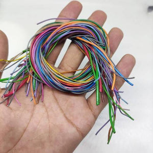 50GRM Multiple Size Flexible Wires Jumper Wire Solder Able Wires Different Colors Mix Length Used - shown as a coiled bundle of multi-colored, thin insulated wires held in a human hand.