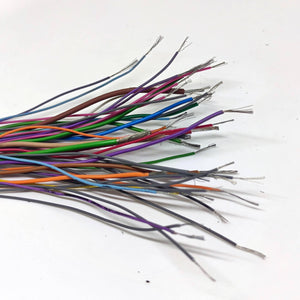 50GRM Multiple Size Flexible Wires Jumper Wire Solder Able Wires Different Colors Mix Length Used - a bundle of multi-coloured, flexible jumper wires with exposed, stripped silver wire ends on a white background.
