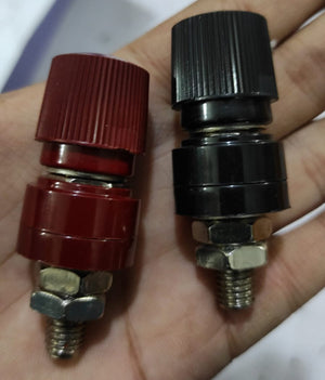 555 Black Red Terminal M8 Blocks Power Supply Terminals Welding Machine Inverter Post Connector - show one red and one black threaded post connector being held in a hand.