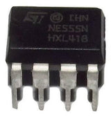 555 Timer IC NE555 LM555 Timer IC - a black, rectangular 8-pin dual in-line package integrated circuit with silver-coloured metal pins.