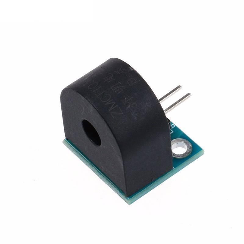 5A Range AC Current Sensor Module - a black current transformer component mounted on a small green circuit board with two metal pins.