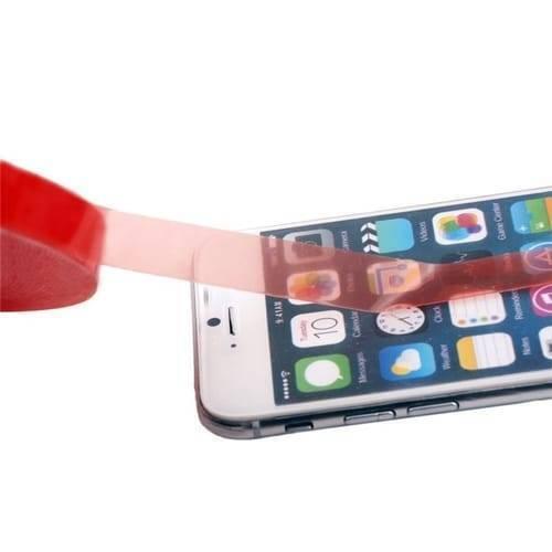 5mm 5 Meter Transparent Adhesive Double Sided Tape For Mobile LCD & Touch Screen - shown as a roll of red-backed clear tape being applied across the screen of a white smartphone.