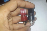 5mm Battery Terminal Stud Remote Battery Binding Post Power Junction Connector Terminal Kit 1 Pair Black + Red - one red and one black post held in a hand.