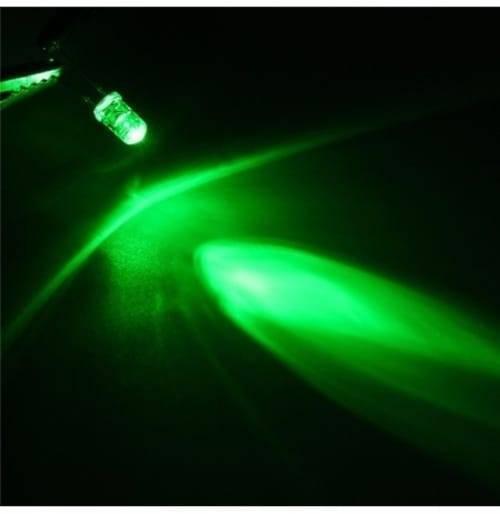 5mm Green Diffused LED Light Emitting Diode - shown glowing bright green in a dark environment while held by a metal clip.