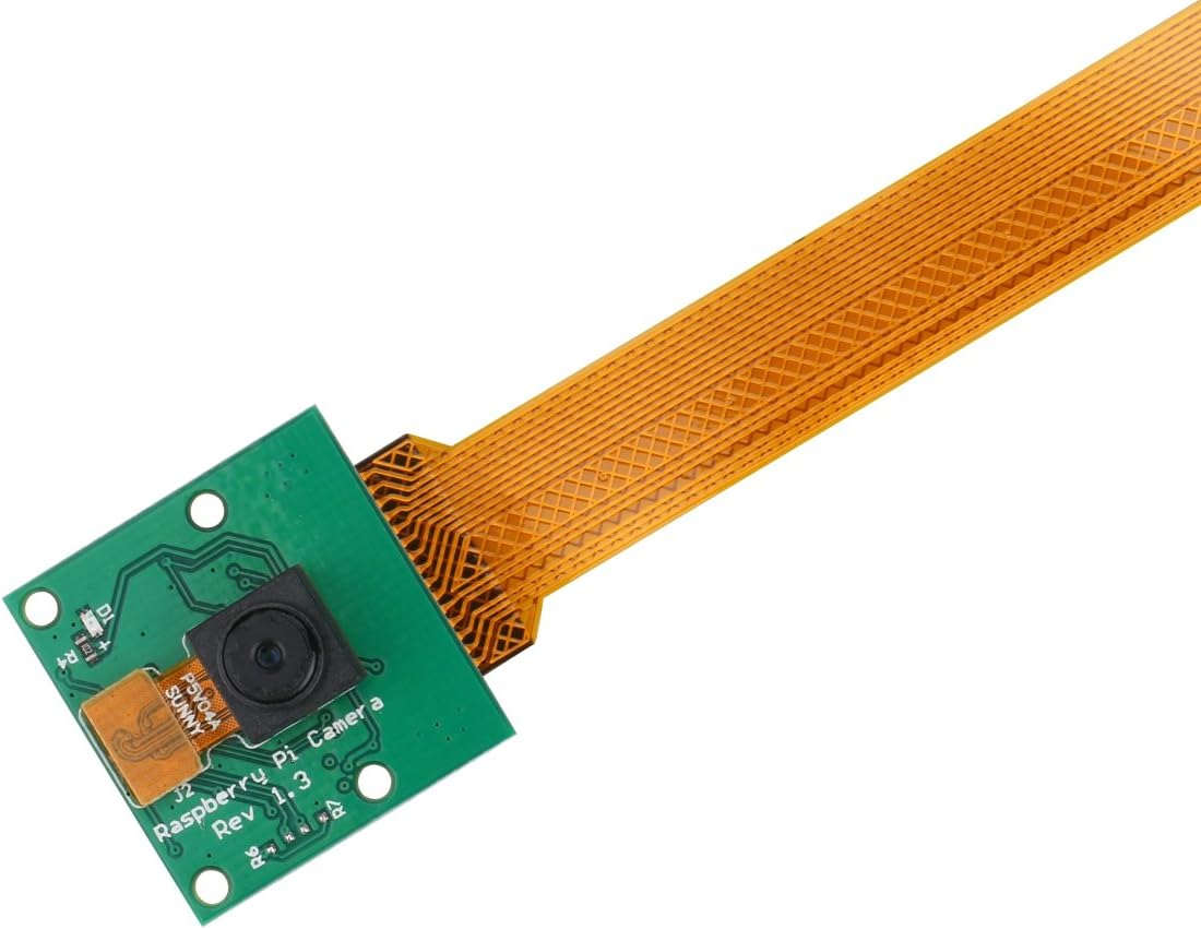 5MP Raspberry Pi Camera Module For Pi 5 And Pi Zero - a green circuit board with a lens and a long, flat orange ribbon cable attached.
