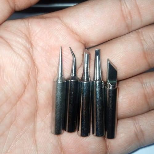 5pcs Lead-free Soldering Iron Tips - shown as a close-up of five silver-coloured metal soldering tips with various shapes held in a hand.