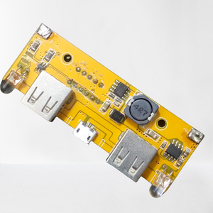 5V 2A 18650 3.7V Battery Charger Charging Module DIY Power Bank - a yellow circuit board featuring two USB ports, a micro USB port, and two LEDs.