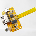 5V 2A Power Bank Module - a yellow circuit board with a USB-A port, a micro-USB port, an LED indicator, and a flexible ribbon cable.