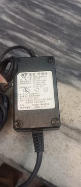 5V 2A Power Supply With Power Cable - a black rectangular AC adapter with an attached power cord and a DC barrel connector plug.