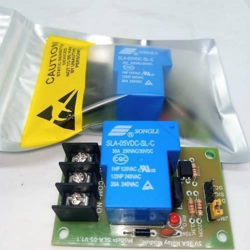 5V 30A Relay Module SLA-05VDC-SL-C - a green PCB with a blue relay, screw terminals, a red LED, and a second unit inside an anti-static bag.
