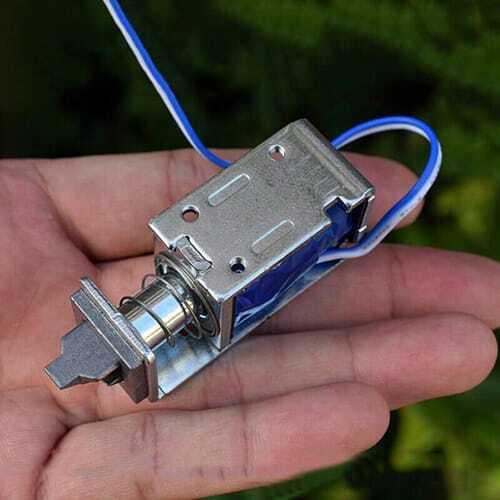 5V-7.4V DC Mini Electromagnet Solenoid Door Lock - a metallic rectangular body, a spring-loaded plunger, and blue and white wires.