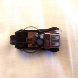 5V DC 0.60A Charger Module USB Car Charger Input 12V DC To Output 5V DC - an internal view of the black plastic housing showing a circuit board, capacitors, a USB port, and an LED.