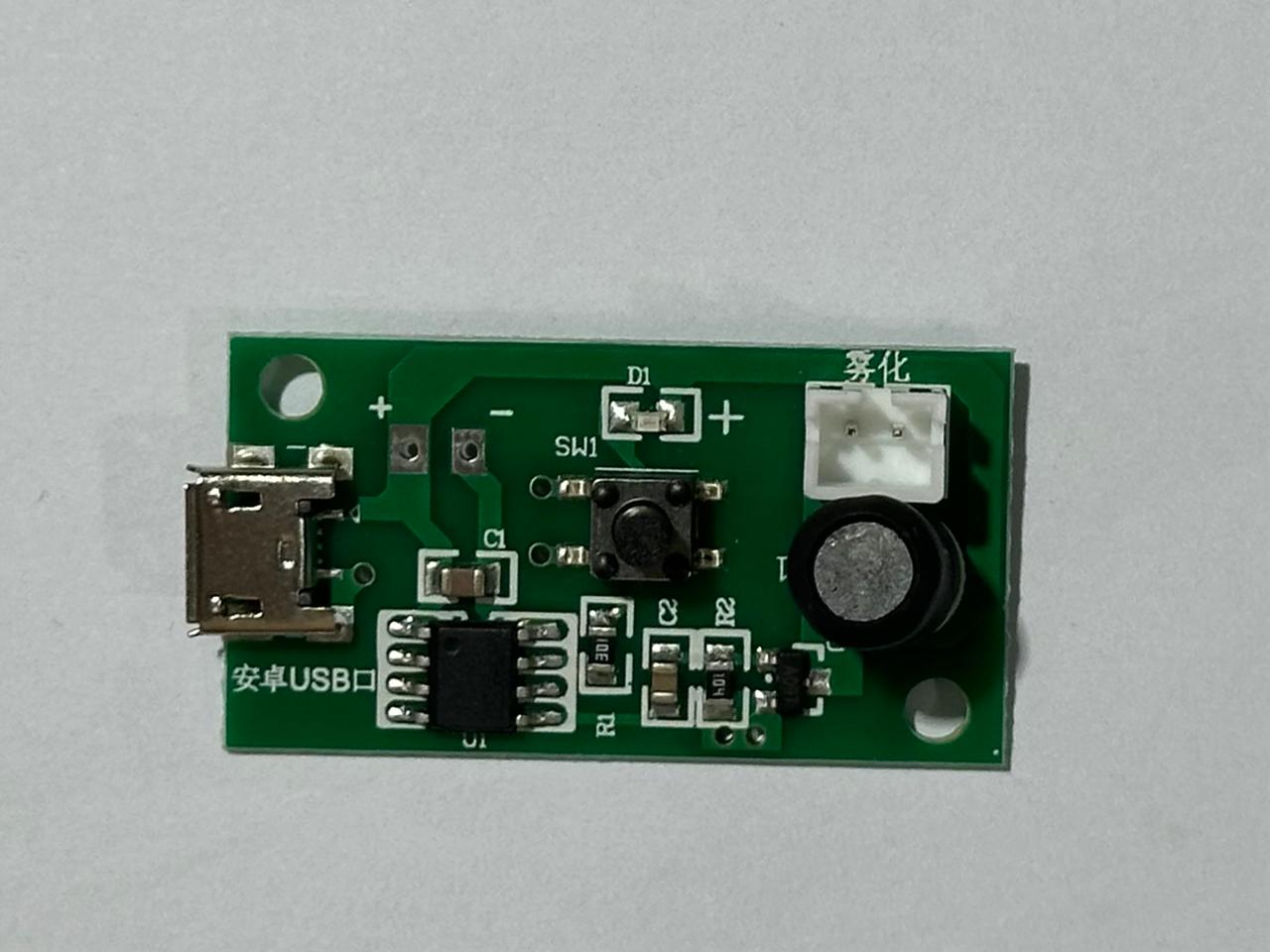 5V Mini Humidifier DIY Kit Mist Maker – USB Fog Module - a green circuit board with a micro-USB port, a push-button switch, and a white connector.