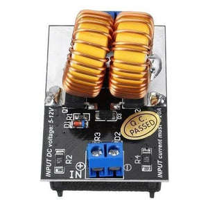 5V To 12V 120W Mini Zvs Induction Heating Power Supply Module With Coil - two large copper coils on a black circuit board with a blue two-pin input terminal.