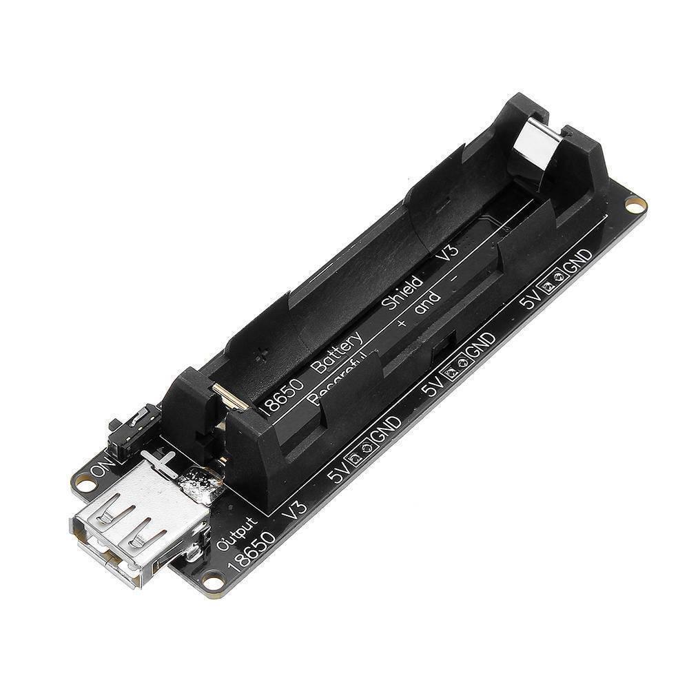 5V UPS 18650 Battery Charging Shield Arduino Battery Shield Nodemcu Battery Shield - a black circuit board with a battery holder, a USB-A output port, a power switch, and labeled 5V and GND pins.