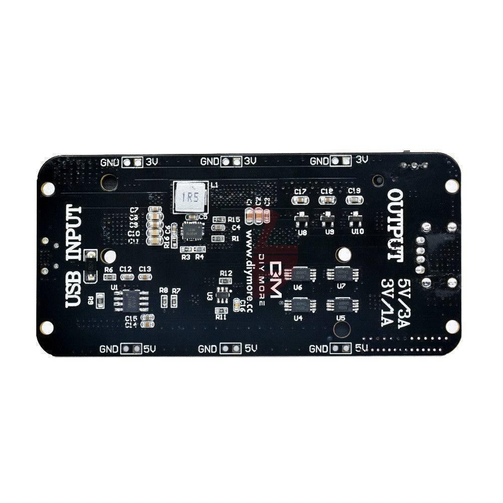 5V UPS Arduino Raspberry Pi Battery Shield - shown as a black rectangular printed circuit board with USB input, output terminals, and labeled pin headers.
