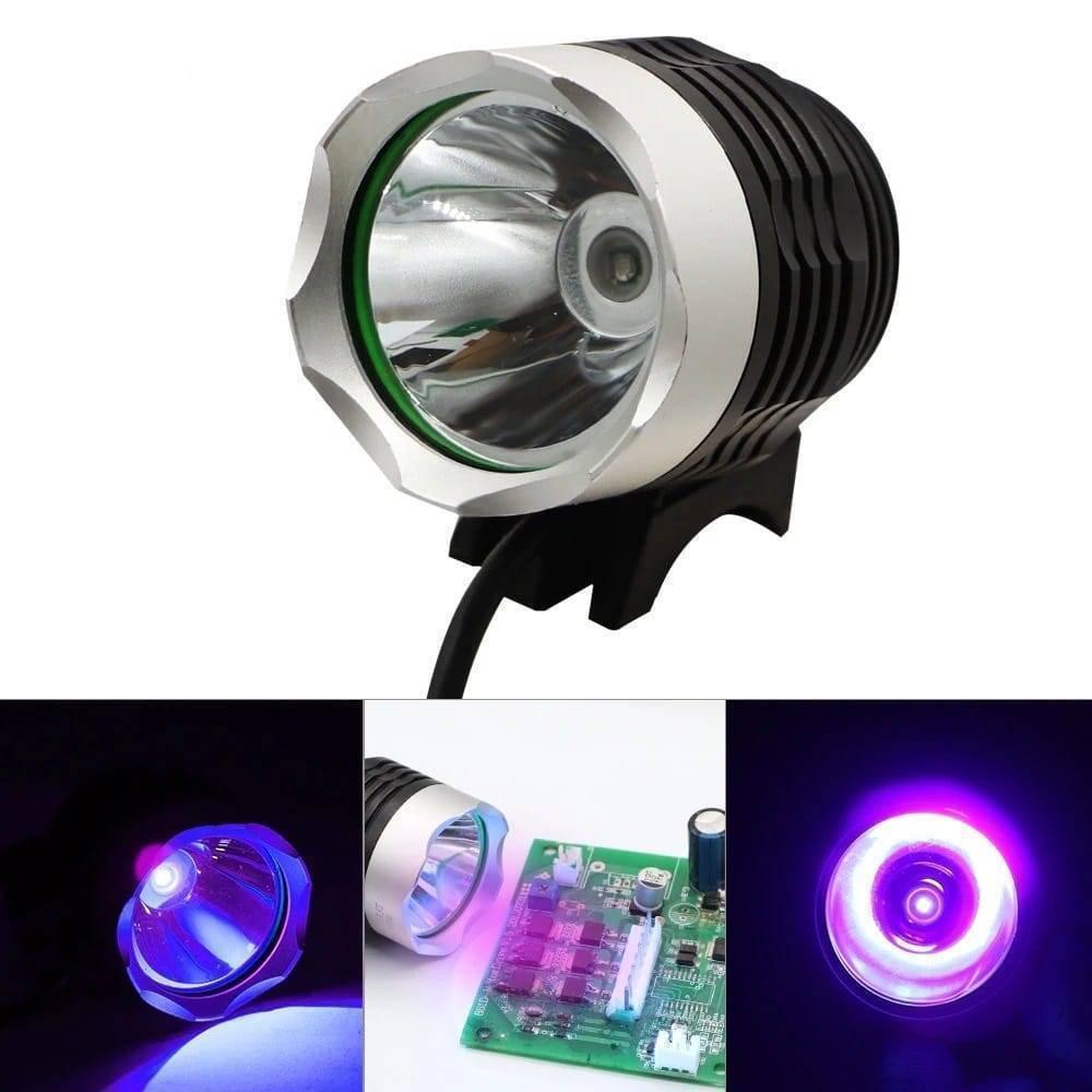 5V USB UV Glue Lamp LED Ultraviolet Green Oil Curing Purple Light - the black and silver lamp head, a power cable, and its purple light emission.