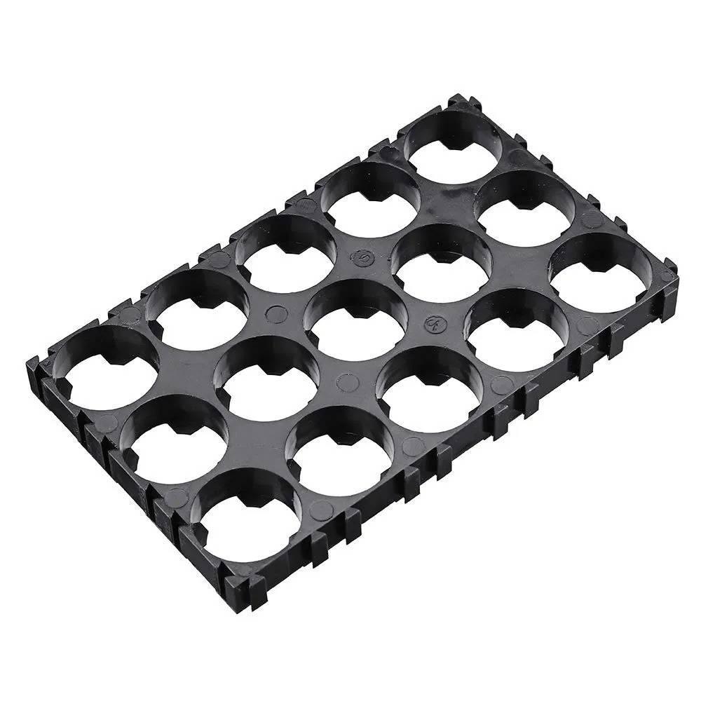 5x3 15 Cell 18650 Battery Spacer Radiating Holder Bracket With Lock For Electric Car Bike - a black plastic rectangular grid with fifteen circular openings for holding batteries.