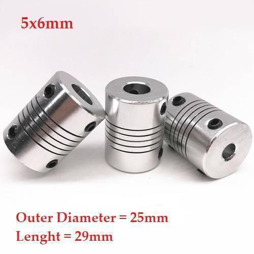 5x6mm Flexible Coupling Shaft With 25mm Outer Diameter - three silver cylindrical metal couplers with grooved bodies and small black set screws on a white background.
