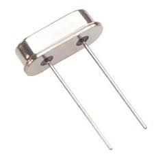 6.1440MHz Crystal Oscillator - shown as a silver-colored, oval-shaped metal component with two long wire leads extending from its base.
