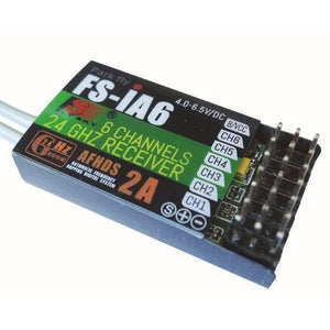 6 Channel Rc Transmitter Receiver Flysky FS-I6 Transmitter With FS-IA6 Receiver - a rectangular black electronic module with two antenna wires and a row of pin connectors for channels and power.
