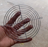 6 Inch Fan Net Fan Jali - a circular silver metal wire safety grille held in a hand.