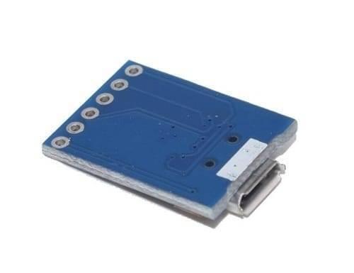 6 Pin CP2102 Micro USB To UART TTL Module Programmer - the blue circuit board from the back with a micro USB port and six pin headers.
