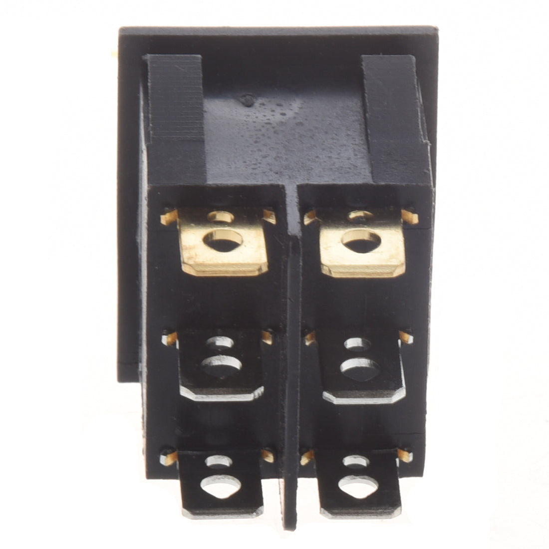 6 Pin Dual Spst Switch-1 X Rocker Switch - a close-up of the black plastic rectangular base with six gold-colored metal electrical terminals.