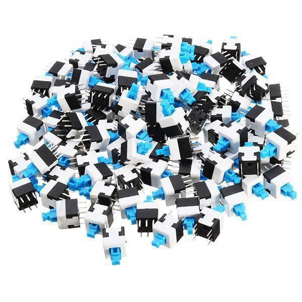 6 Pin Push Lock Button 7x7 PCB Mount Dpdt Switch - shown as a large pile of individual white and black plastic switches with blue push-button actuators.