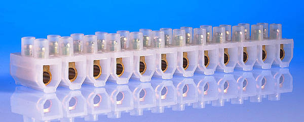 60 Amp Connector Strip, 12 Way PVC - shown as a single white plastic block with twelve metal-lined electrical connection ports arranged in a row.