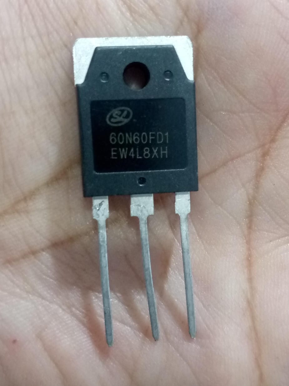 60N60FD1 MOSFET - 600V 60A N-channel Power Transistor - a black three-pin electronic power transistor held in a hand, showing the printed model number and specifications on its front face.