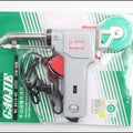 60W Manual Automatic Tin Welding Gun 941-60 Soldering Gun - a grey pistol-grip soldering iron with a green solder spool, sealed in its original retail blister packaging.