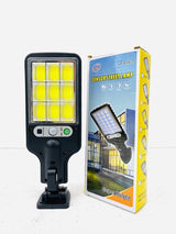 616-4 Motion Sensor Street Lamp - shown with its black plastic body, LED light panel, sensor, power button, and its matching retail box.