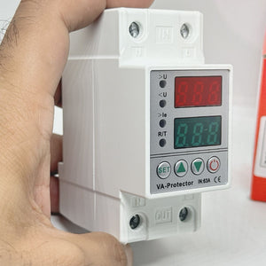 63A 230V Adjustable Over Under Voltage Protector Voltage Ampere Relay Protection Breaker With Over Current Protector | Digilog.pk - a white DIN-rail device held in a hand, featuring LED displays, indicator lights, and four buttons.