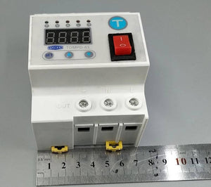 63A Automatic Re connection Circuit Breaker Over and Under Voltage Leakage Protection Current to Protect Relay - TOMZN TOMPD-63 circuit breaker, a white modular device with a digital display, red power switch, three output terminals, and a metal ruler for scale.