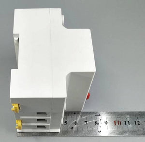 63A Automatic Re connection Circuit Breaker Over and Under Voltage Leakage Protection Current to Protect Relay - shown from the side, featuring yellow terminals and a metal ruler indicating its dimensions in millimeters.