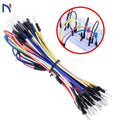 65pcs Jump Wire Cable Male To Male Jumper Wire For Arduino Breadboard 1 Bag - a bundle of multi-colored wires with male connectors and an inset showing them used on a breadboard.