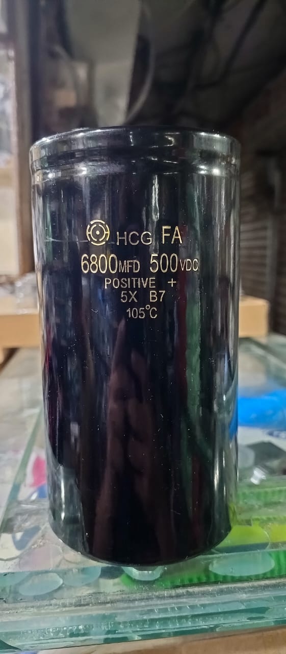 6800uF 500V Capacitor For Solar Inverter - a cylindrical black electrolytic capacitor with HCG FA 6800MFD 500VDC 105°C printed on the side.