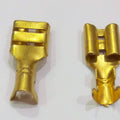 6mm Electrical Cable Thimble Golden Color - two golden-colored female spade crimp connectors viewed from the front and back against a white background.