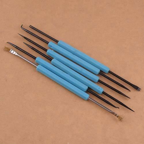 6pcs Solder Assist Disassembly Tools Kit Fit For BGA PCB Repair Rework Weld - six double-ended tools with blue plastic handles and various metal tips arranged diagonally on a brown surface.