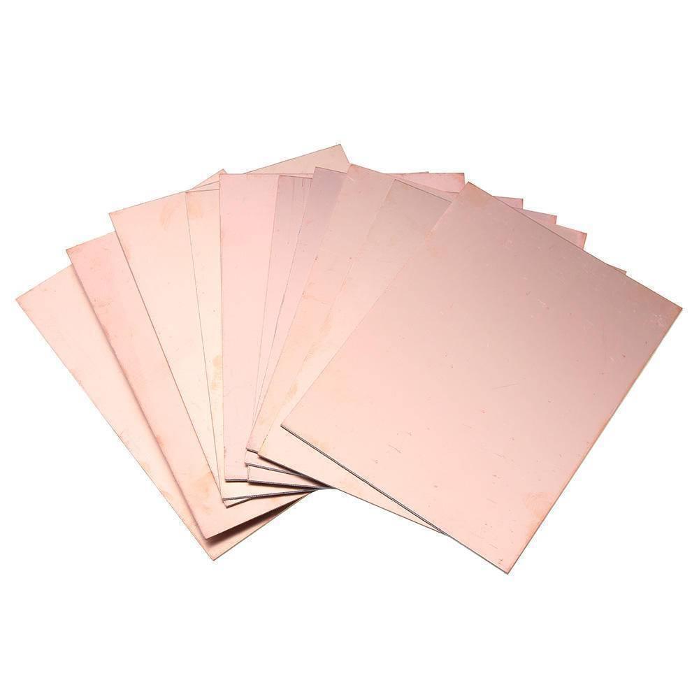 6x4 Double Sided Copper PCB Board FR4 Fiberglass PCB Board - shown as a stack of several rectangular, copper-clad fiberglass sheets.