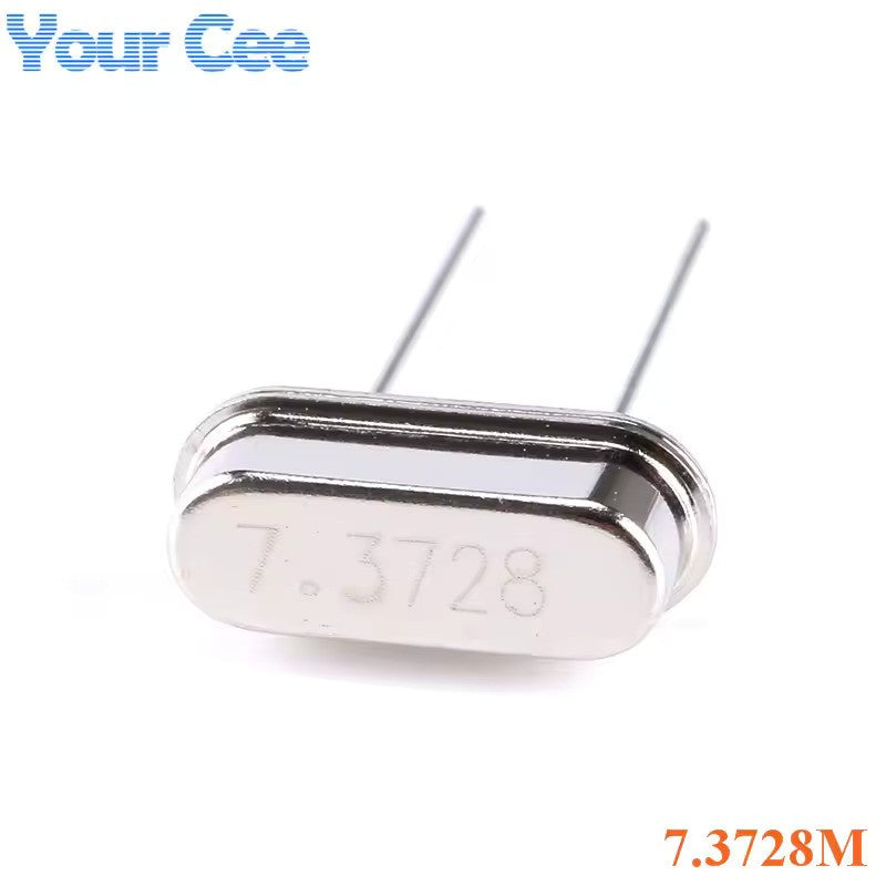 7.3728MHz Crystal Oscillator For Local Solar Inverter - a silver-coloured, oval-shaped metal component with two wire leads and the text 7.3728 etched on its surface.