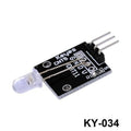 7 Color Flashing LED Module Ky 034 Hw-481 - shown as a black circuit board with a clear LED and three metal connector pins.