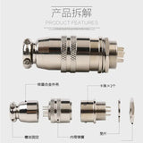 7 Pin 12mm Mic Circular Connector - shown in an exploded view, displaying its silver-colored metal housing, internal components, washers, and locking nuts.