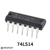 7414 74LS14 Schmitt Trigger Hex Inverter IC - a black 14-pin dual in-line package integrated circuit with silver pins, viewed from an elevated angle.